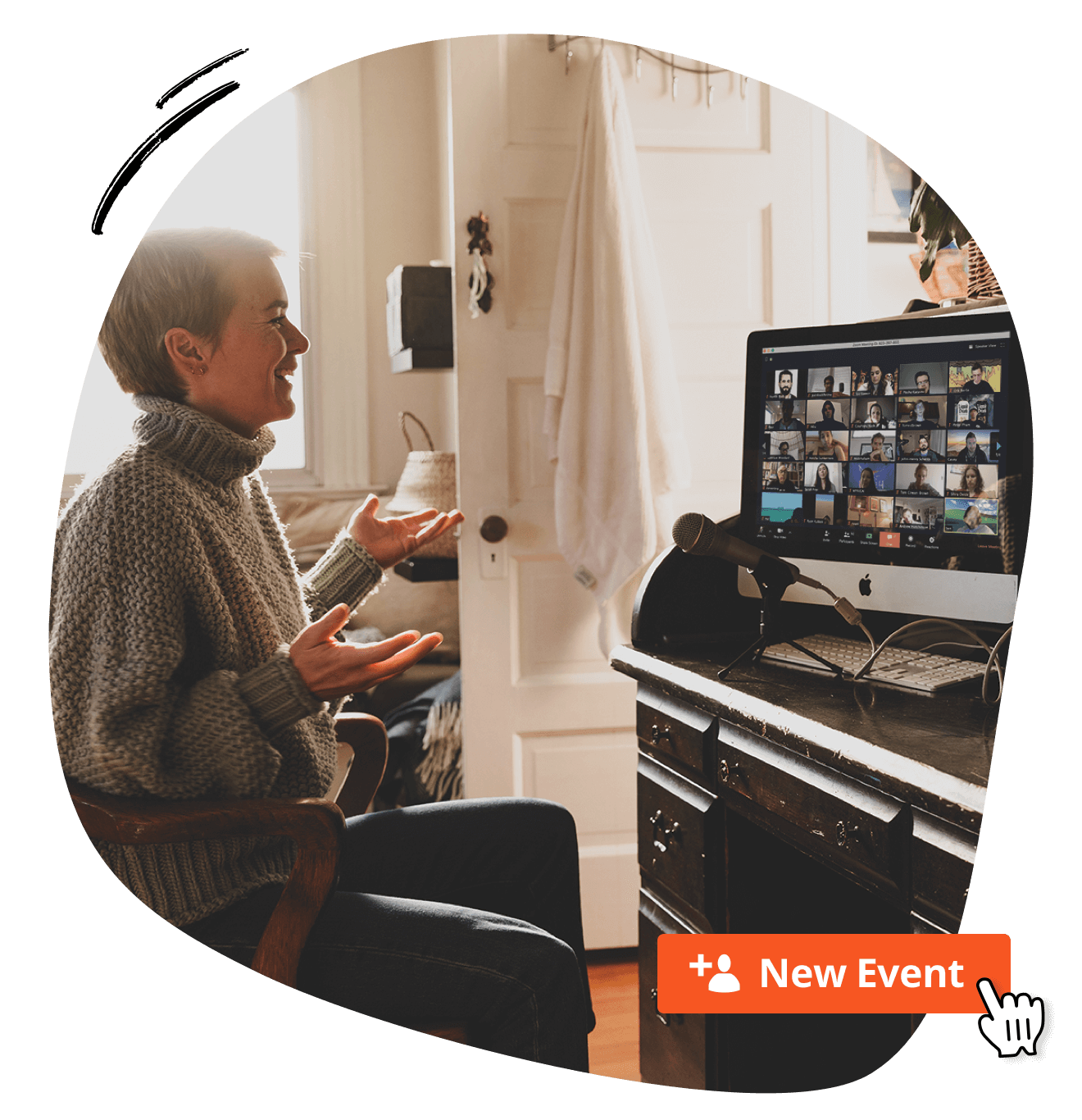 A woman sitting in front of a computer while on a zoom virtual webinar call.