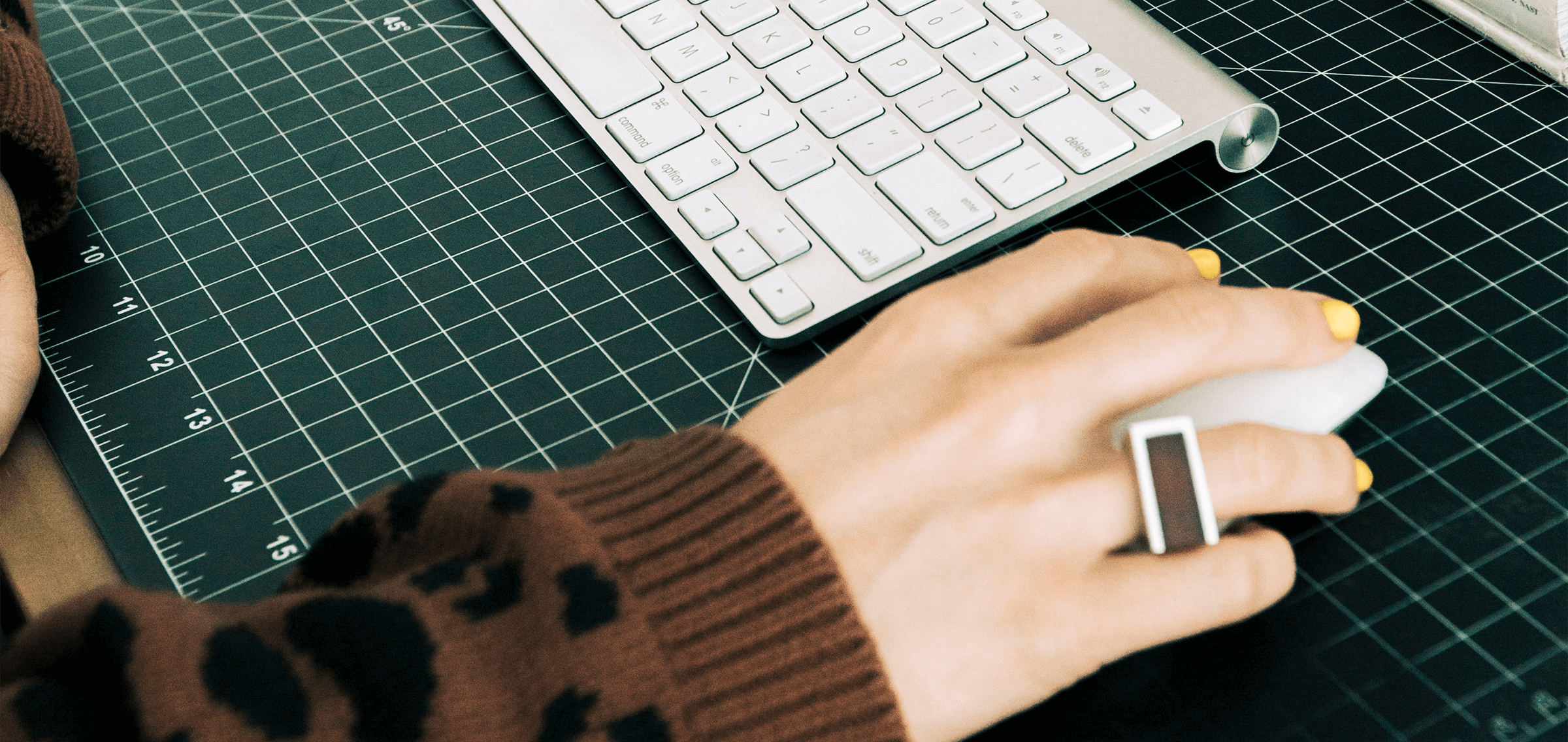 A computer user operating a wireless mouse