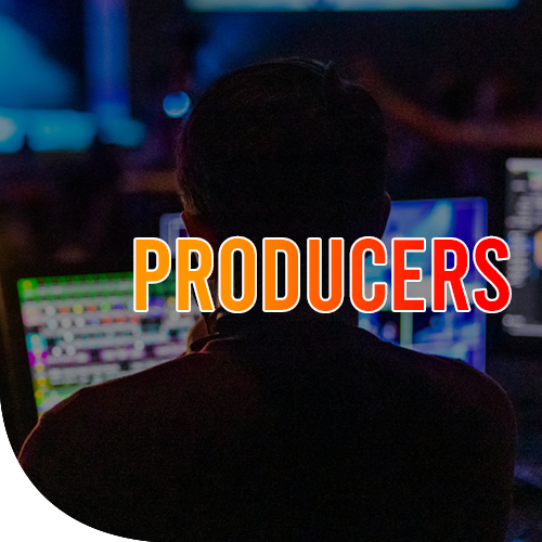 A male facing two computer screens