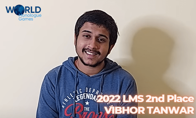 Vibhor Tanwar - A dark colored guy with a black hair and moustache wearing a blue hoodie in a beige background