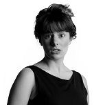 Black and white portrait of Emma Zaia on a white background