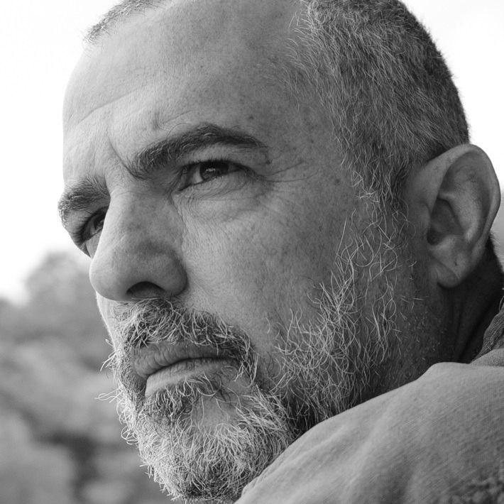 Stewart Glen - A middle aged man with a full grown beard 