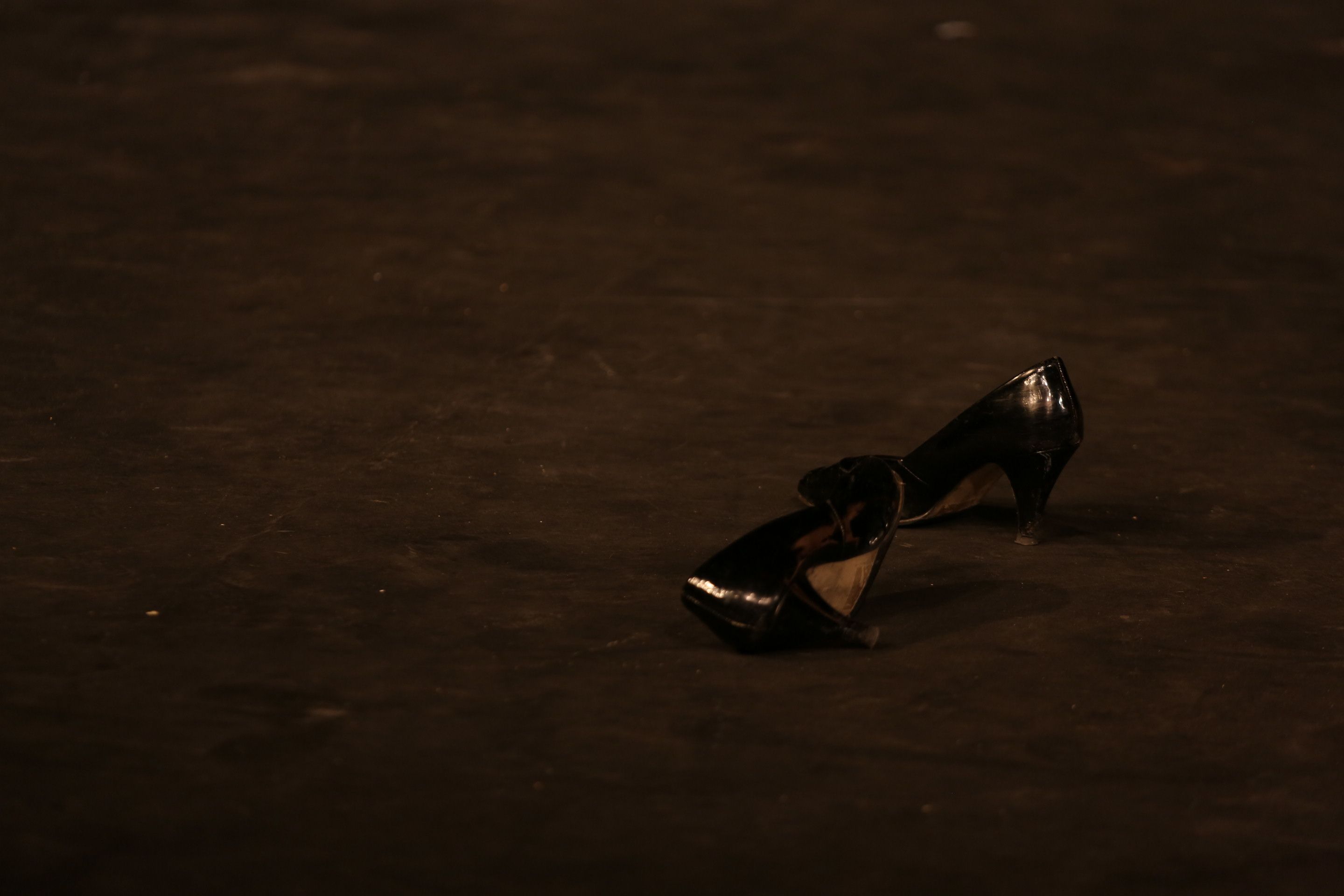 A pair of black heels in stage