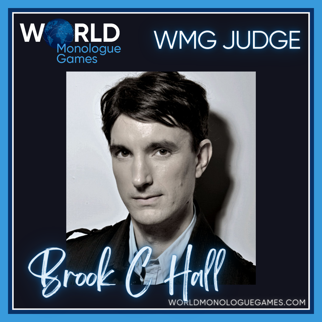 Brook C Hall - Image of a black haired guy wearing a black jacket and light blue polo shirt