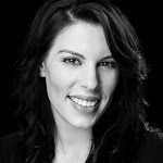 Mikaela Franco, smiling in a black and white image