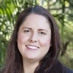 Kathryn Koromilas, A smiling brown haired woman