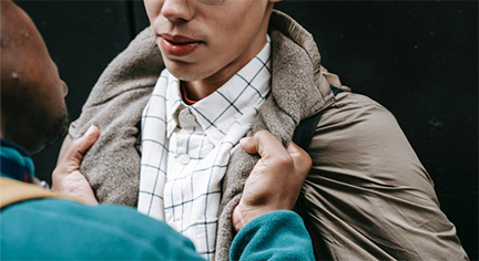 Two guy fighting fiercely fighting each other