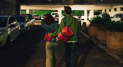 Two couples walking towards the Parking lot