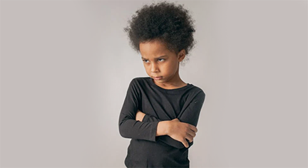 A girl with afro hair looking fierce