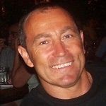 Phil Chaffey - A guy with a black hair, smiling and wearing black shirt