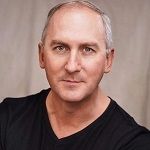 Matt Young - A white guy with a white hair in a black shirt