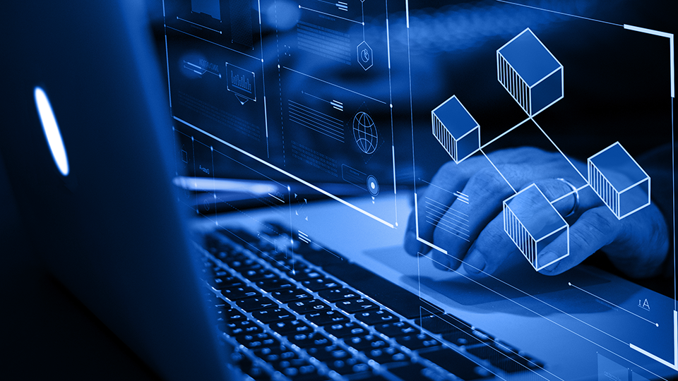 A hand in a laptop with futuristic hologram of the screen