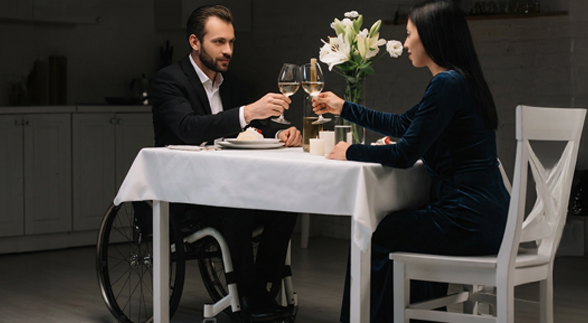 A bunch of tax documents, a yellow post it that says "Tax time!" and a small alarm clock beside it.