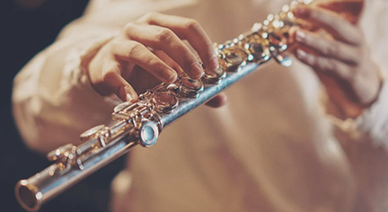 A man playing a flute