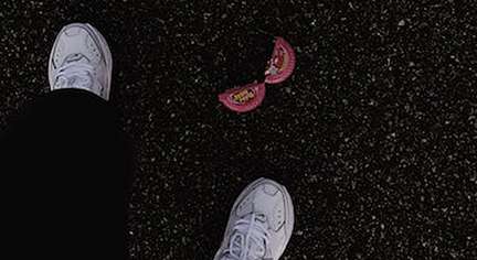 A bubble gum case on the ground