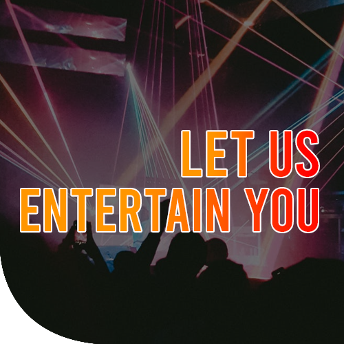 Blue, pink and yellow light strands from a spotlight inside a bar