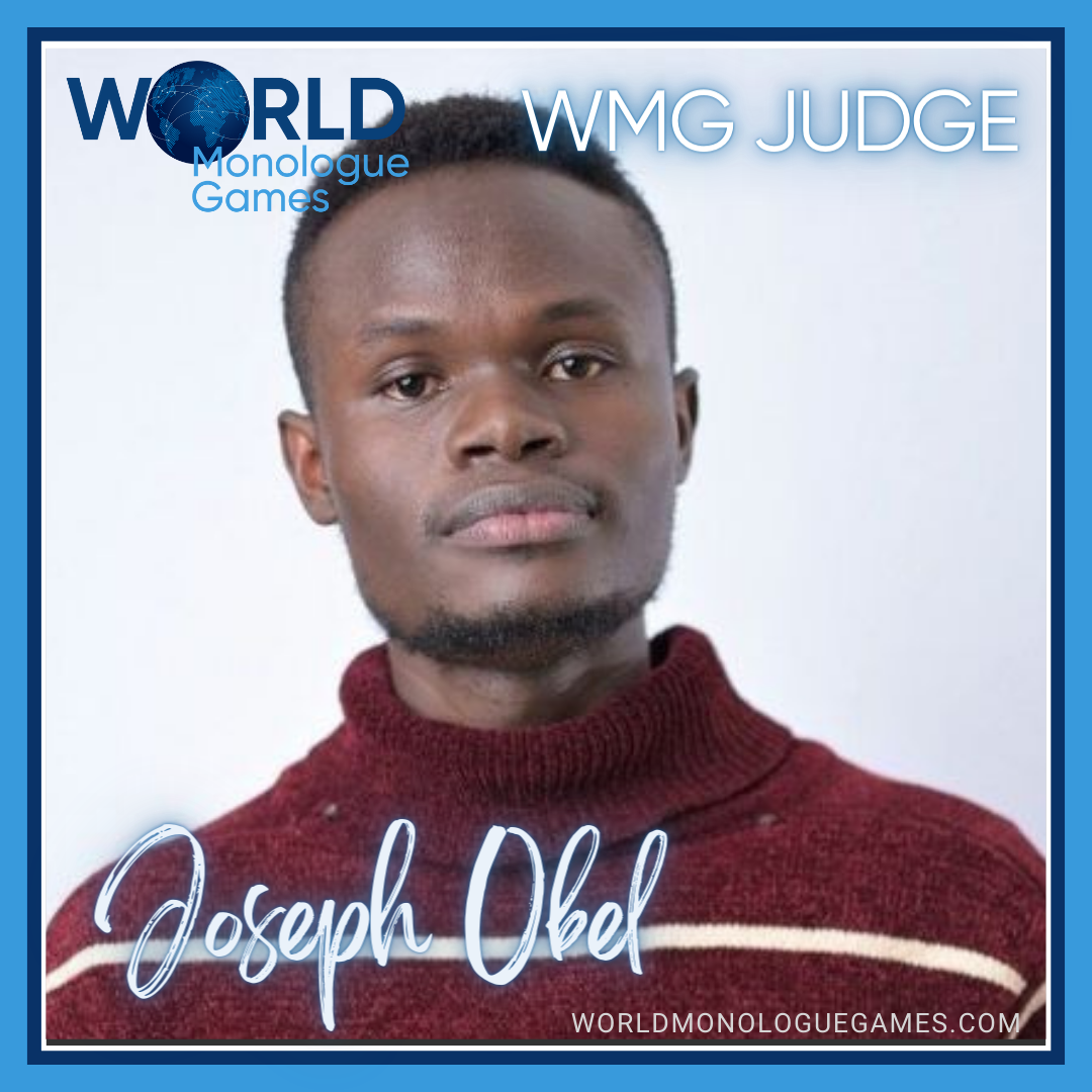 Joseph Obel - A shorty curly haired man wearing a striped maroon turtle neck sweatshirt