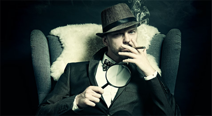 A detective sitting in a chair holding a magnifying glass while smoking a tobacco