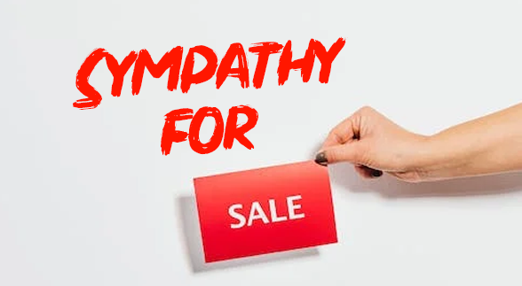 Red text that says "Sympathy For" and a female hand holding a red carboard that says "SALE"
