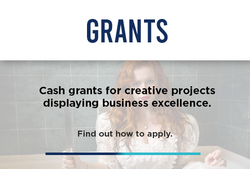 Cash grants for creative projects, a woman actor in the background