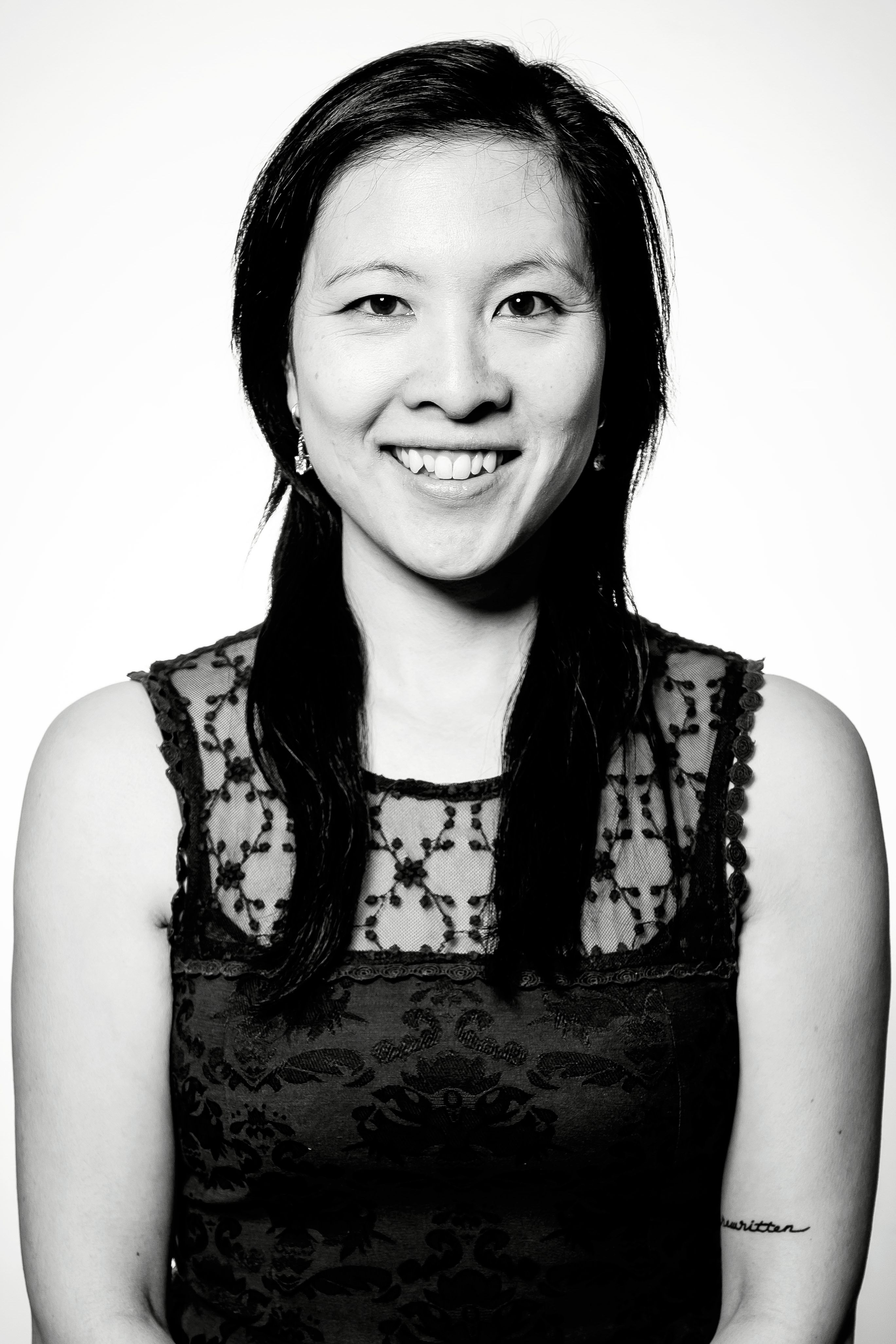 Wendy Samantha, Asian girl, with a medium length hair wearing a textured blouse