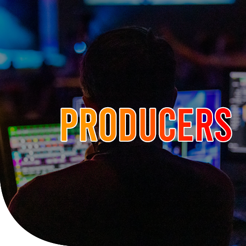 A male facing two computer screens