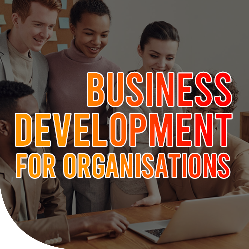 Team of people looking in a laptop 