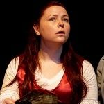 Ebony Halliday, A red haired girl wearing a dress with a combination color of red and white