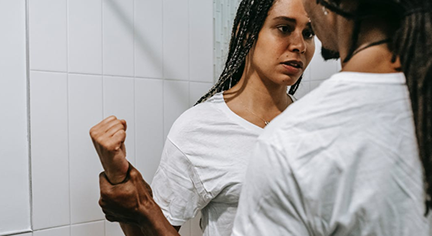 A man and a woman arguing with each other