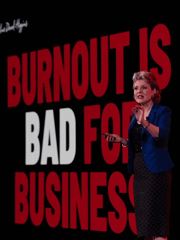 Caroline Dowd-Higgins presenting on stage