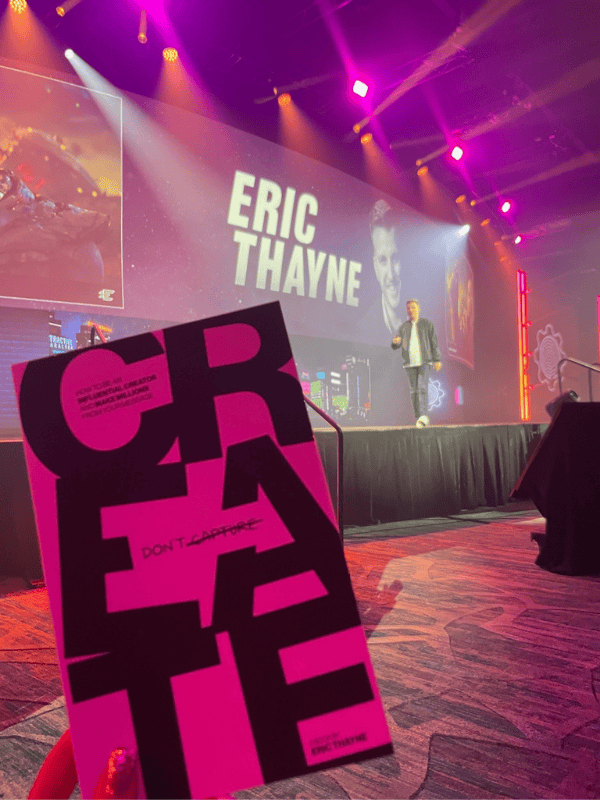 Eric Thayne, author of Create Don't Capture, speaking on stage