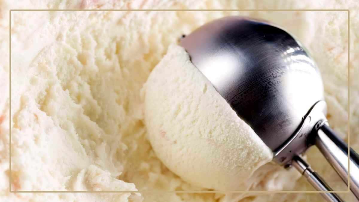 vanilla ice-cream being scooped by a metallic scoop