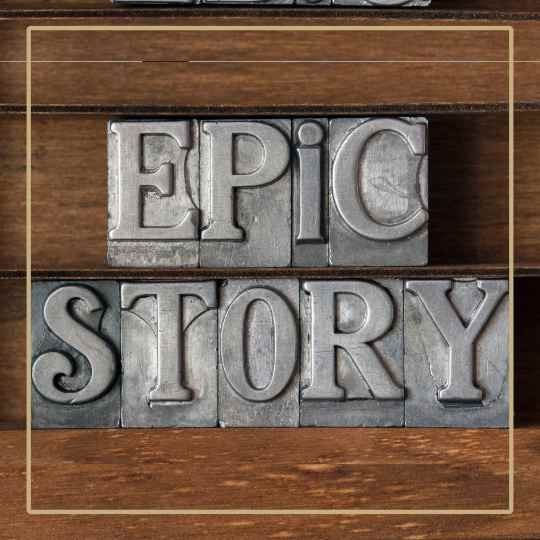 Sign in silver metallic saying epic story on a wooden background