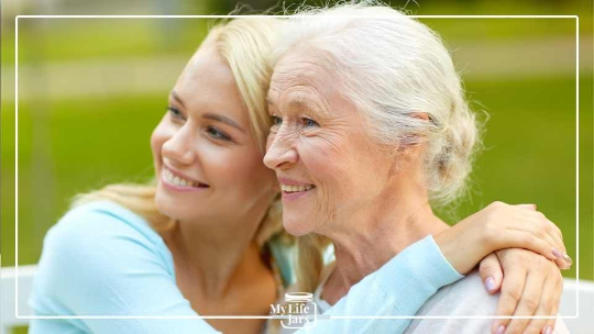 older female hugging younger female