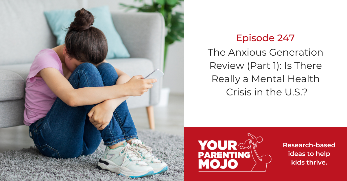 A teenage girl sits curled up on a living room floor, knees drawn to her chest, looking down at her phone with a posture that suggests worry or distress