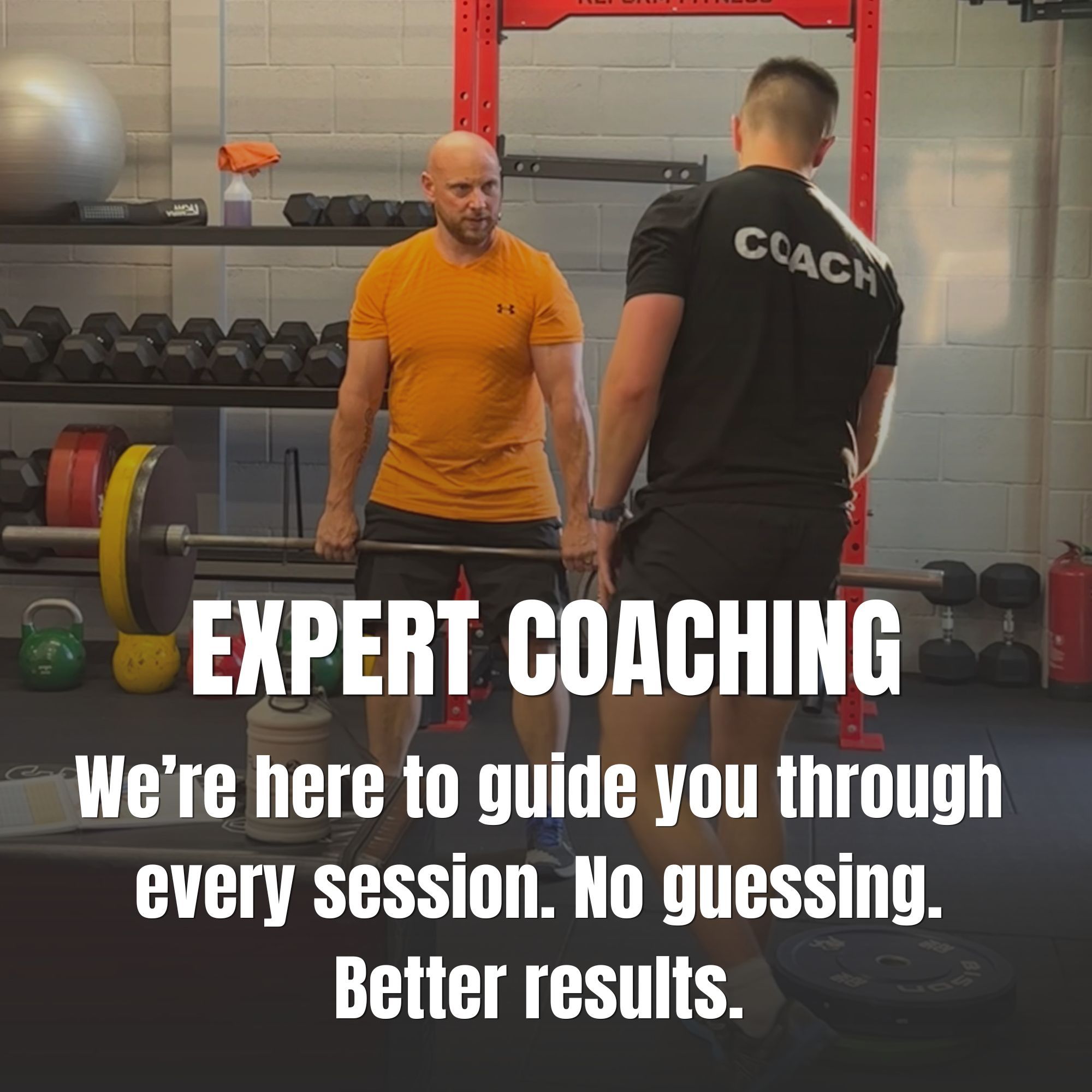 A man being coached how to deadlift at Reform Fitness.