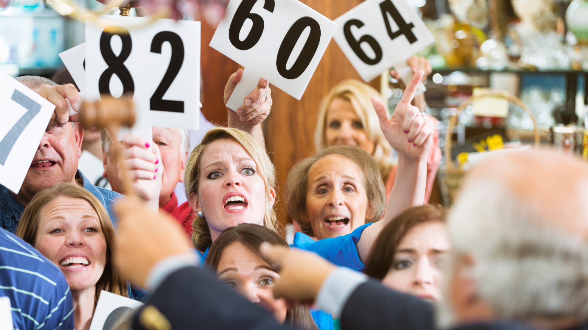 Crowd participating in a 2024 Australian property auction event.