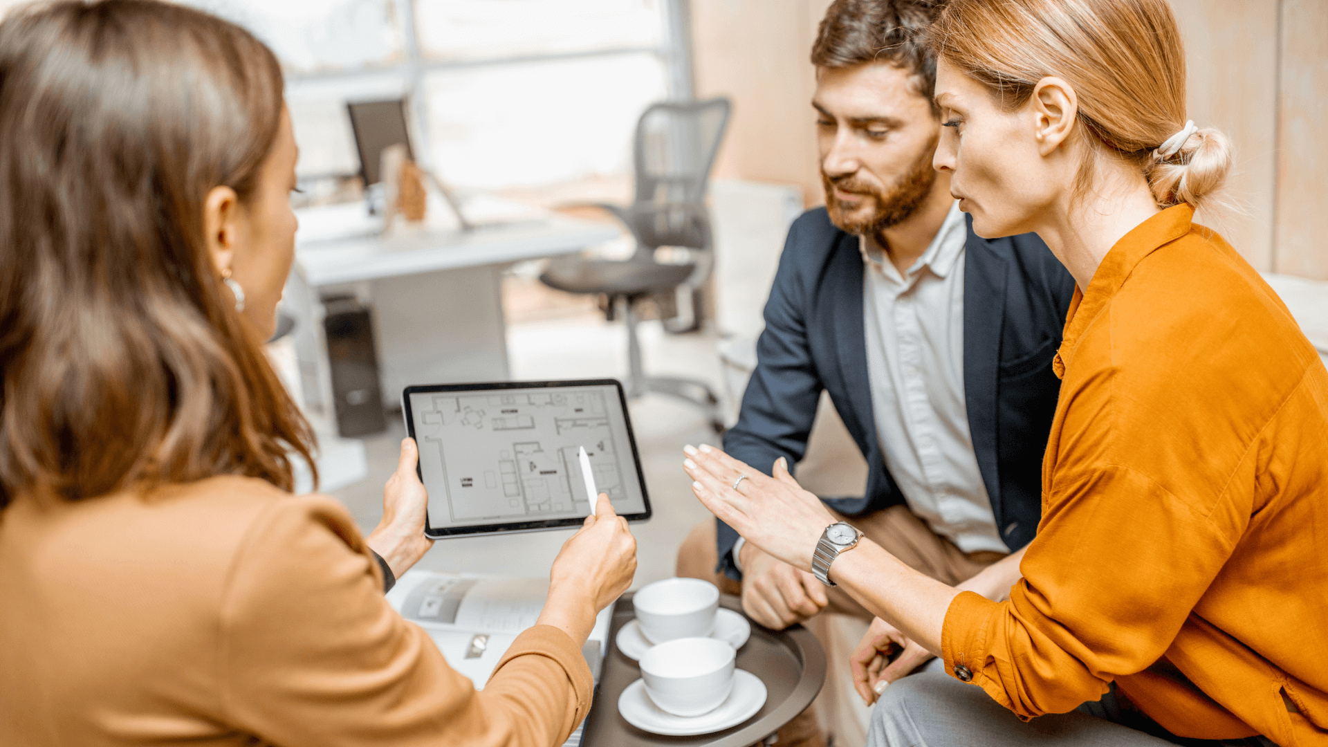 A photo of a consultation session with a property expert or a buyer's agent, depicting the professional support available to investors.