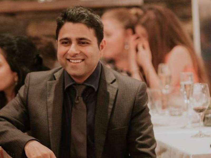 Amar | Smiling while giving positive testimonial review to Get RARE Properties and the help provided in strategising his property portfolio