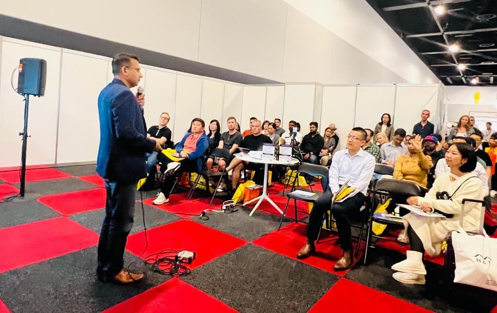 People attentively attending a mortgage masterclass