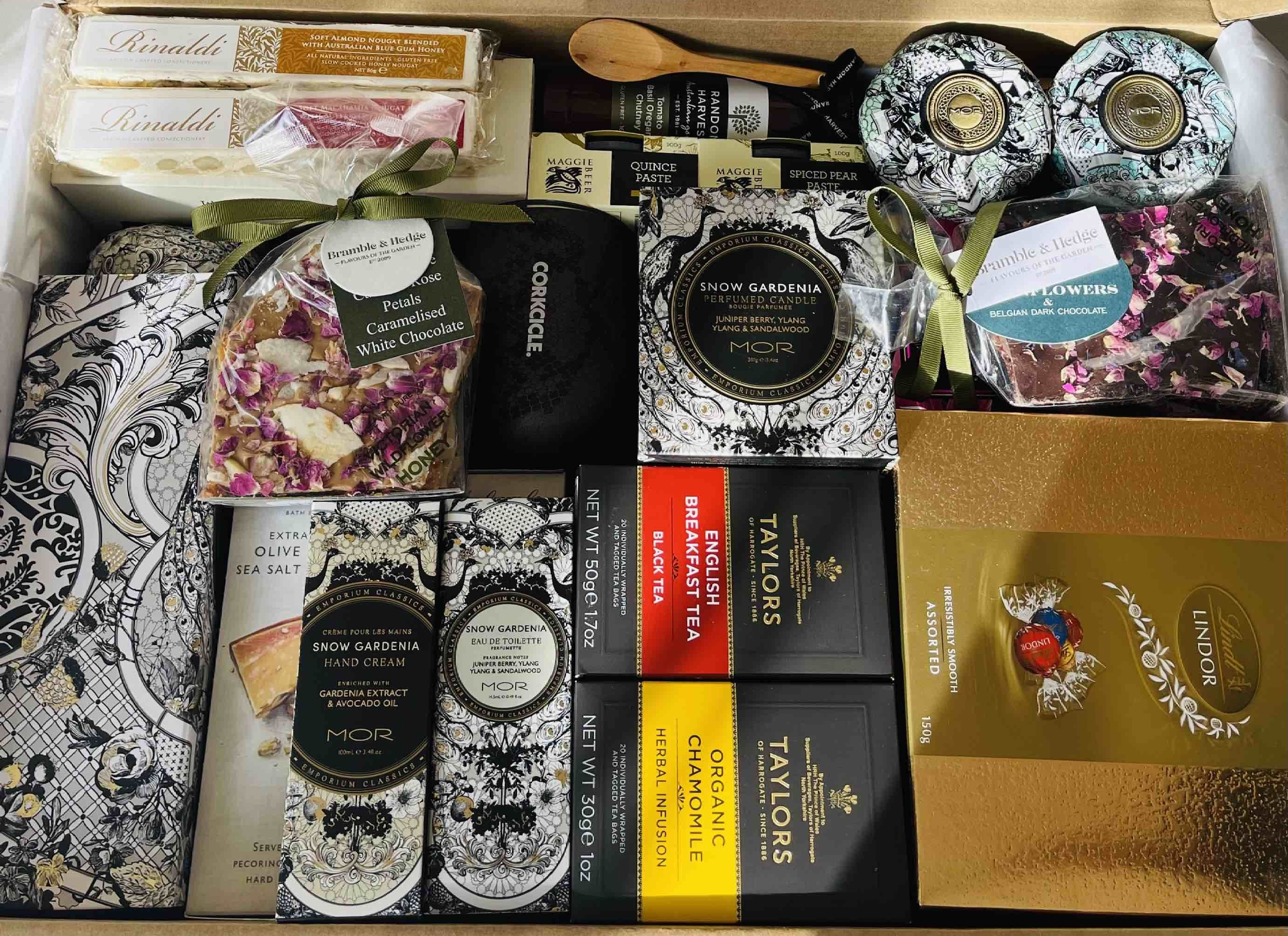 If you need to send a hamper to loved ones or staff in Sydney, we offer hampers Sydney for all occasions. Our popular Sydney gift hampers spread joy far and wide. View our bestselling range of hampers designed for special occasions and for all ages. From a birthday to luxurious Christmas hampers Sydney packed full of artisan and traditional Christmas foods, to newborn gift baskets from our range of baby hampers, through to corporate gift hampers delivered in Sydney to businesses of any size. We can also send fast and contactless lockdown hampers in Sydney metro and greater Sydney region to anyone in self-isolation. Choose a hamper Sydney residents will love. With our gift baskets, Sydney gift delivery options including same day shipping to the Sydney metro area, and next business day delivery, click and collect from our Sydney warehouse, and express shipping options for hampers in NSW. Our fast and free standard gift basket delivery Australia-wide is also available. 