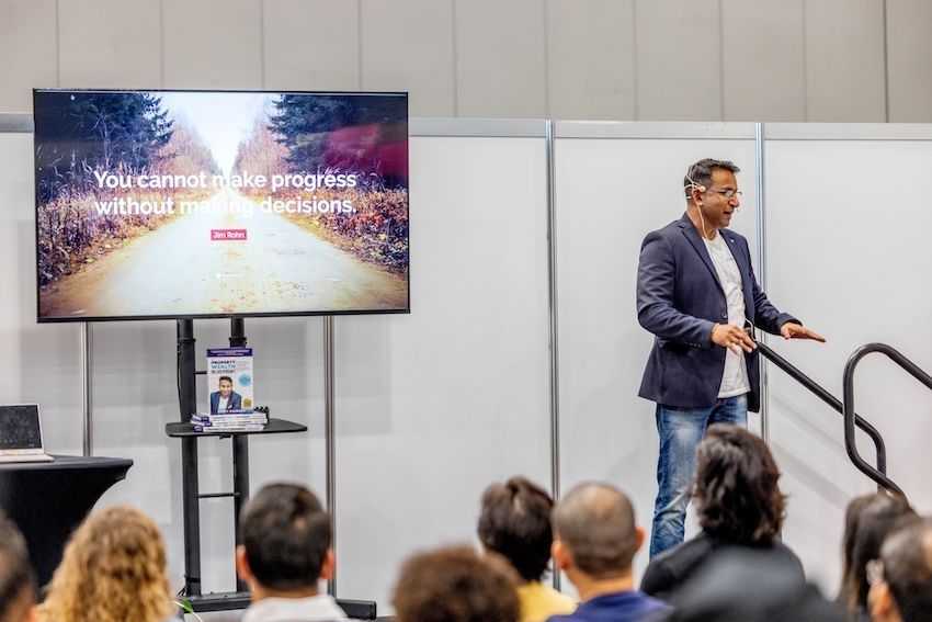 Rasti Vaibhav educating a group of eager first-time investors at the Property Expo