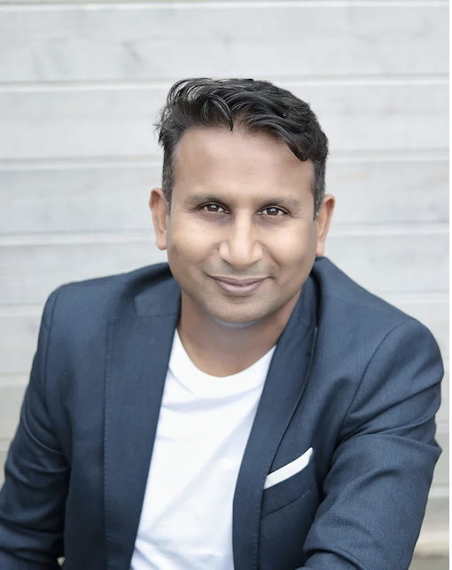 Headshot of Rasti Vaibhav, Founder of Get RARE Properties, CFA Charterholder