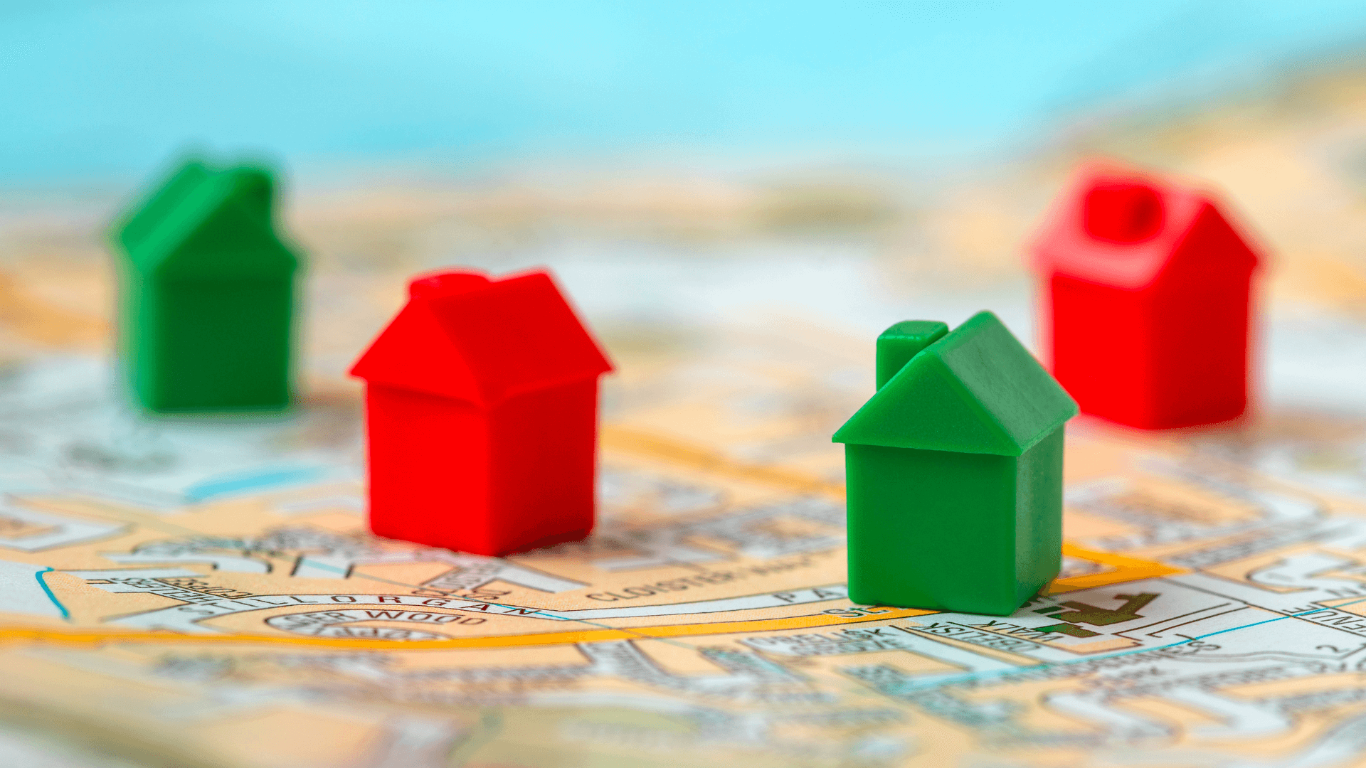 A visual representation of a diversified property portfolio, possibly showing different types of properties as pieces of a larger puzzle.