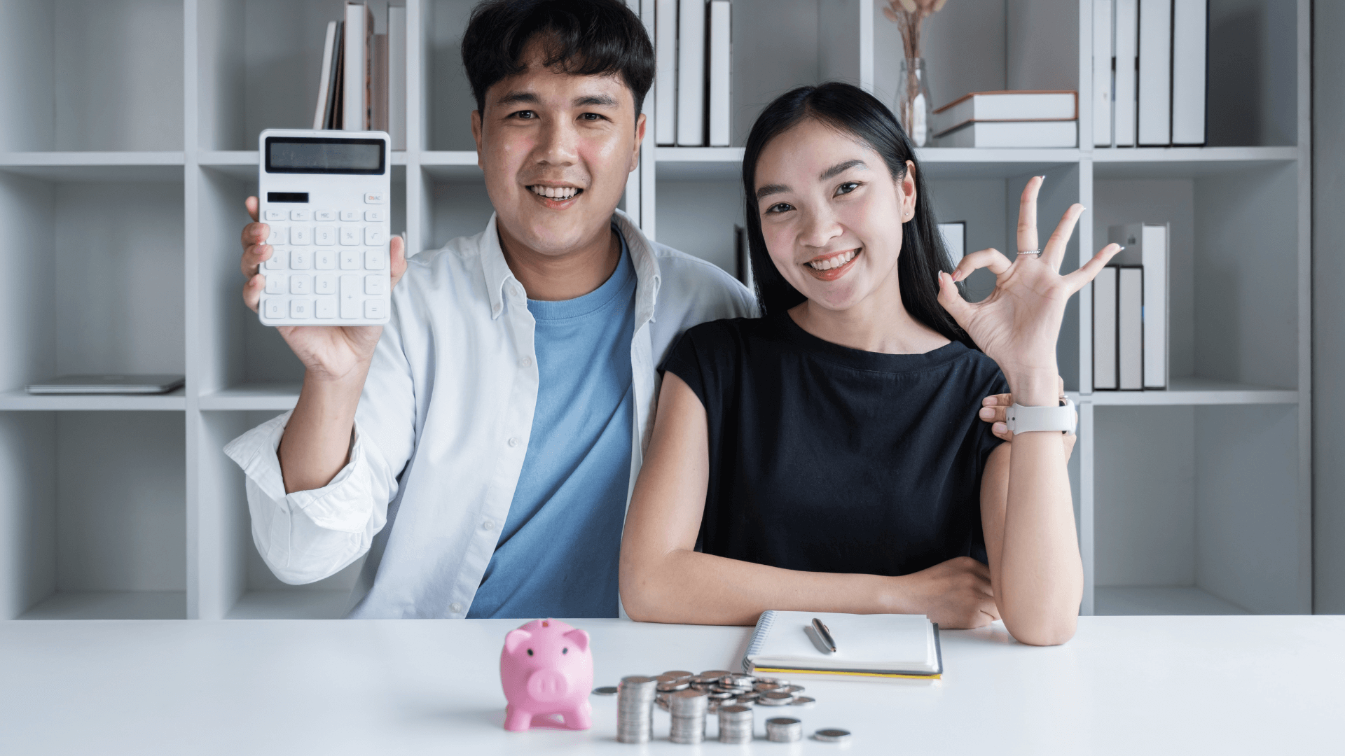 Individual happily calculating mortgage savings