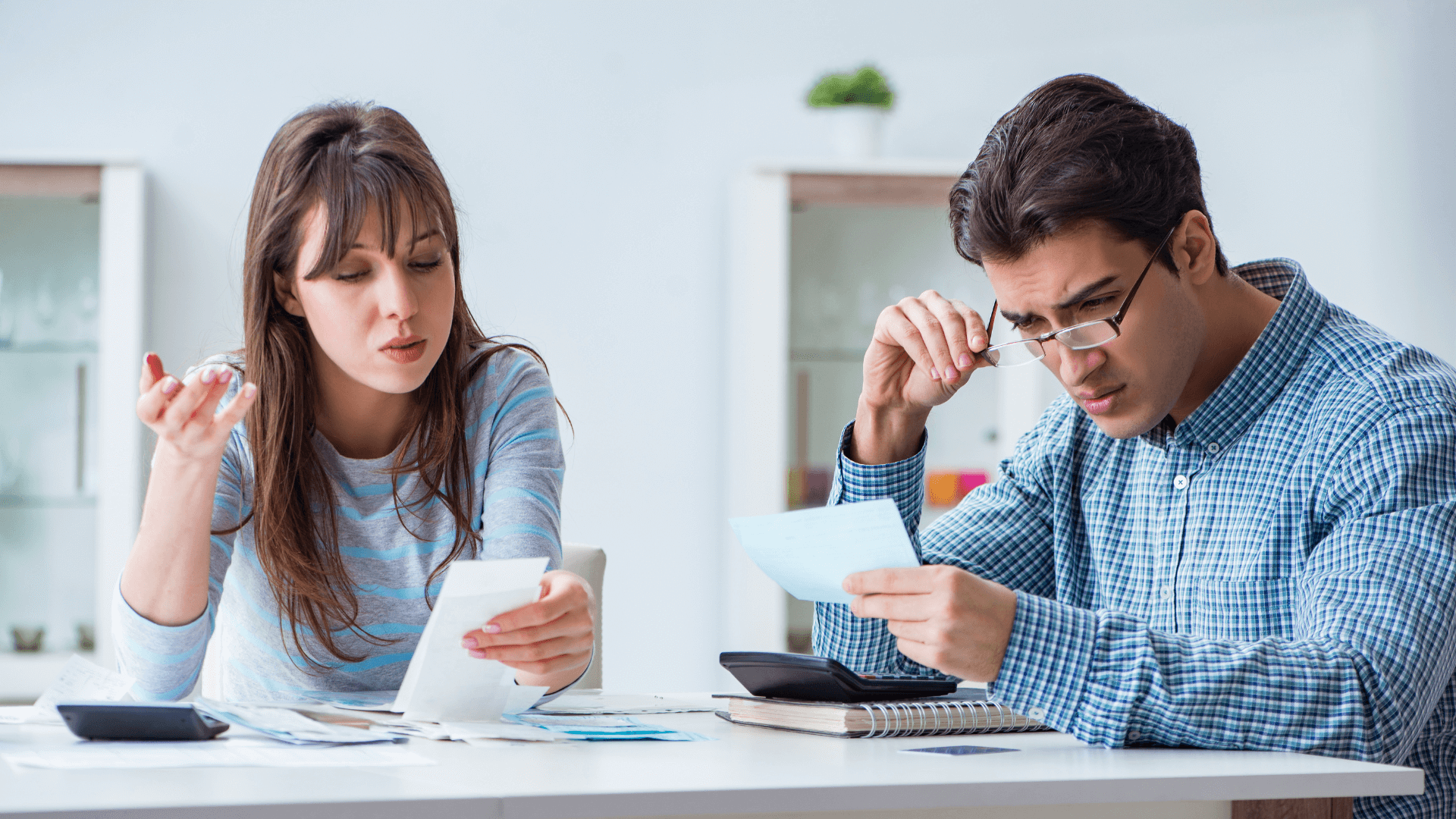 Concerned family discussing mortgage repayments