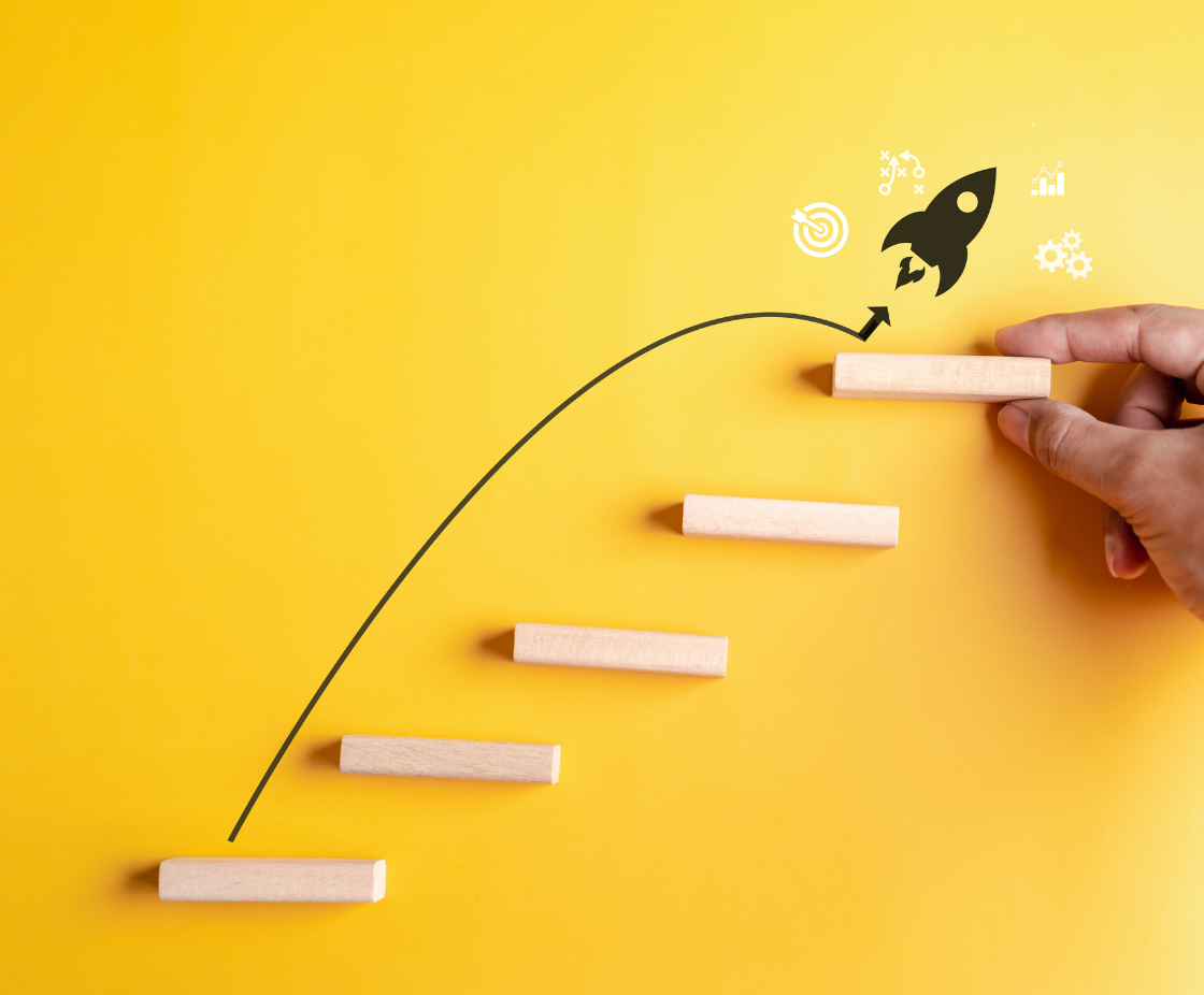 Steps leading to a rocket launch – symbol of business growth and implementation support