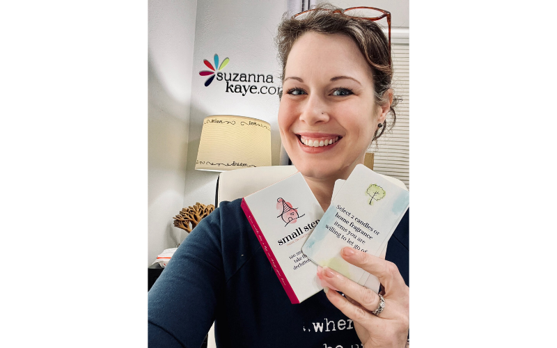 Suzanna holding the Small Step Card Deck