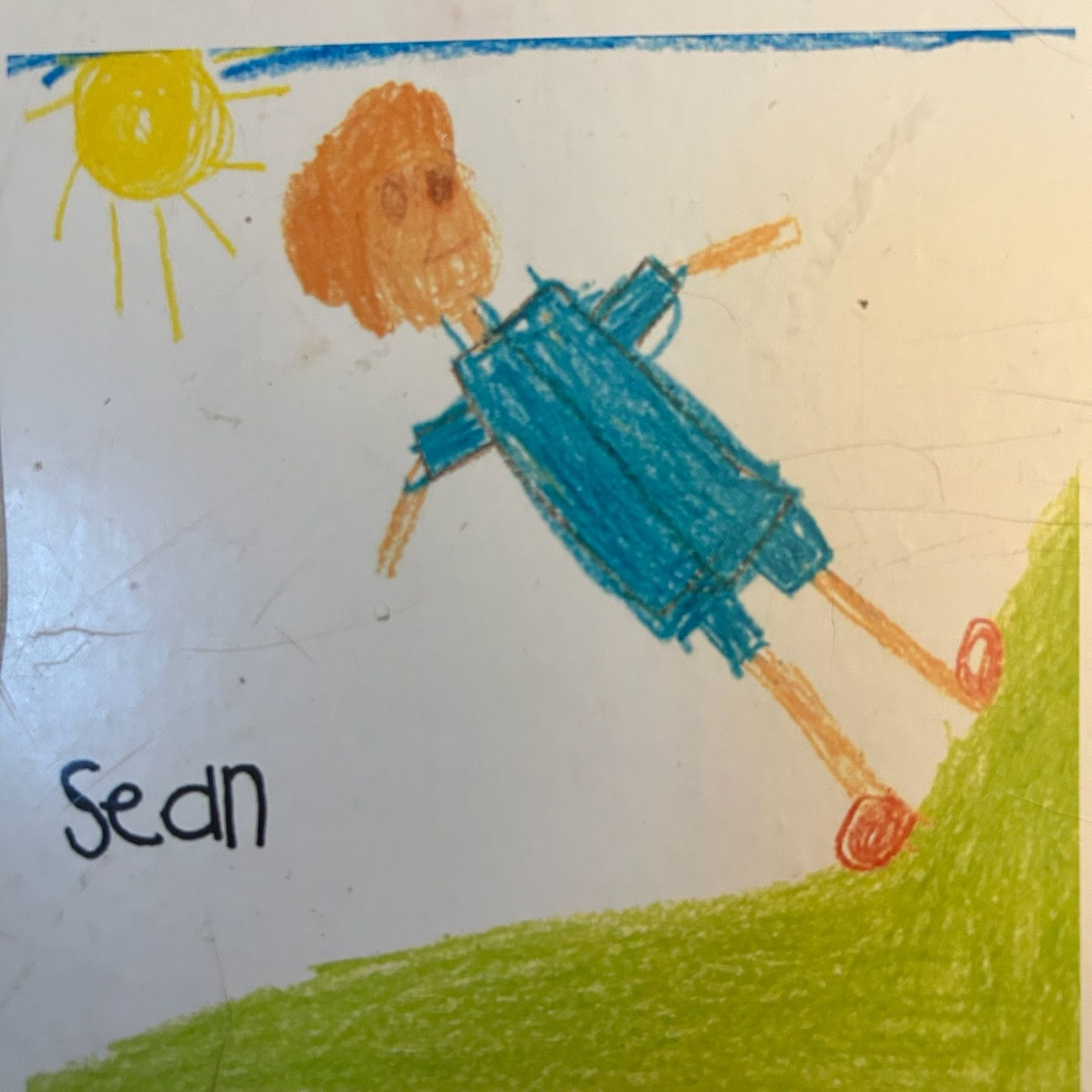 Drawing of a child on a grassy hill under the sun