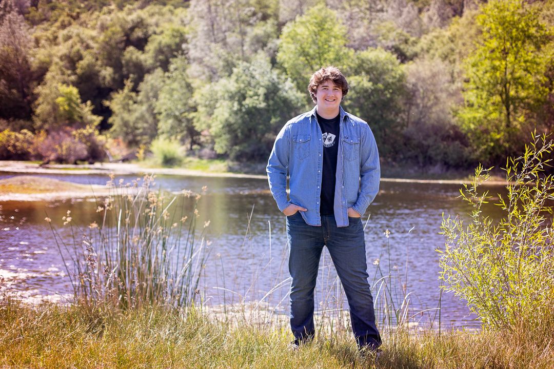 A family portrait frame hangs in white wall